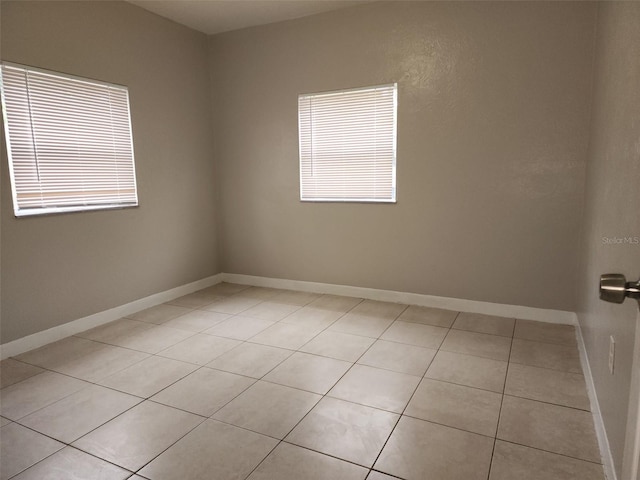 view of tiled spare room