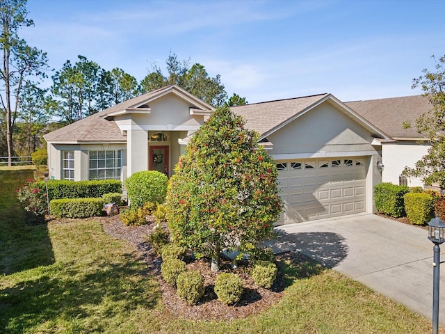 ranch-style house with a front lawn and a garage