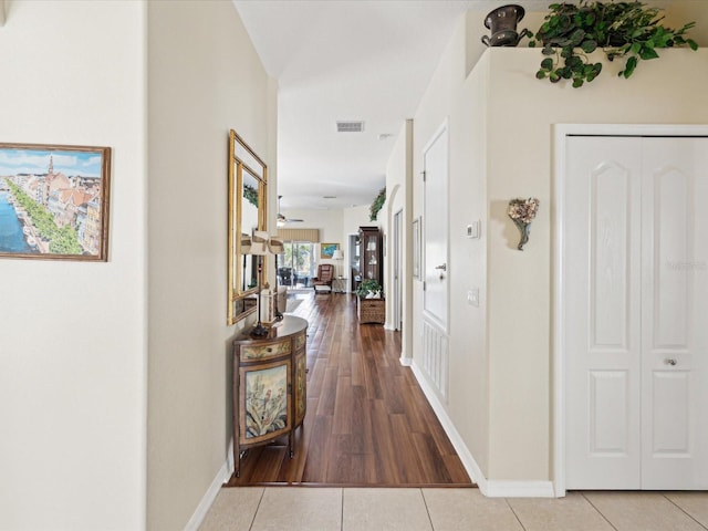 corridor featuring tile patterned floors