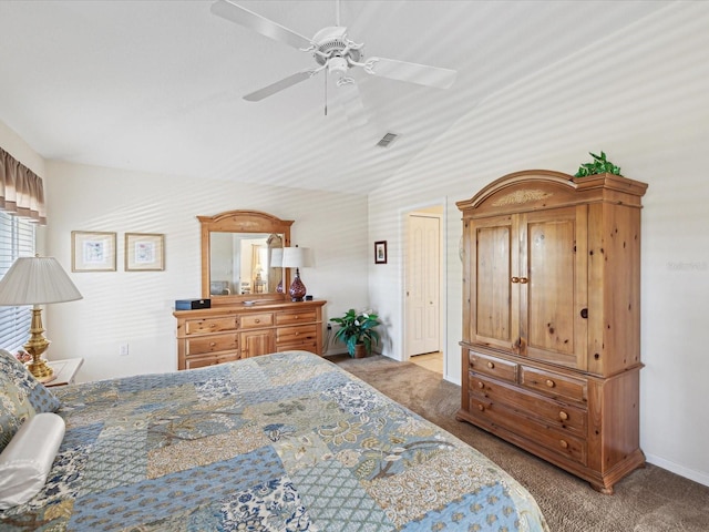 carpeted bedroom featuring lofted ceiling and ceiling fan