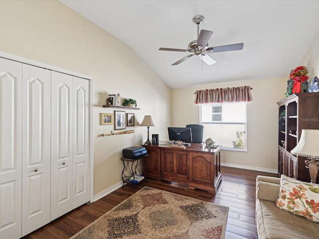 office area featuring vaulted ceiling, dark hardwood / wood-style floors, and ceiling fan