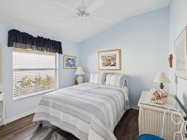 bedroom featuring ceiling fan, vaulted ceiling, and dark hardwood / wood-style floors