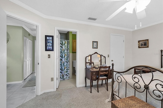 carpeted bedroom with connected bathroom, a textured ceiling, ceiling fan, and crown molding