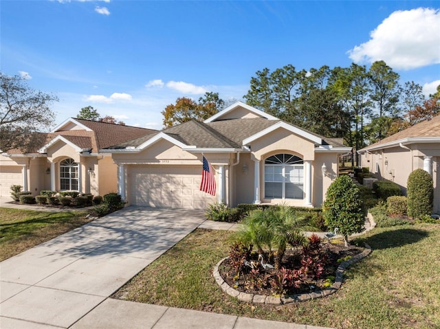 single story home featuring a front yard and a garage