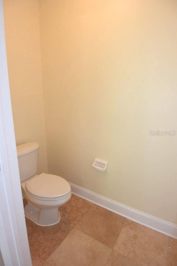 bathroom featuring toilet