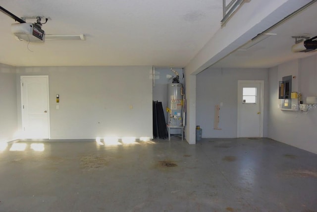 garage with electric panel, water heater, and a garage door opener