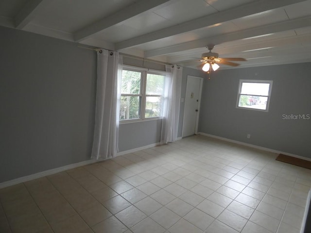 unfurnished room with ceiling fan, light tile patterned flooring, and beam ceiling