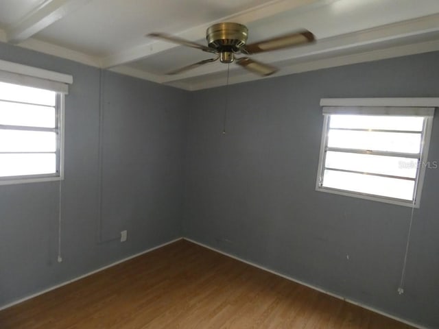 unfurnished room featuring ceiling fan and hardwood / wood-style flooring