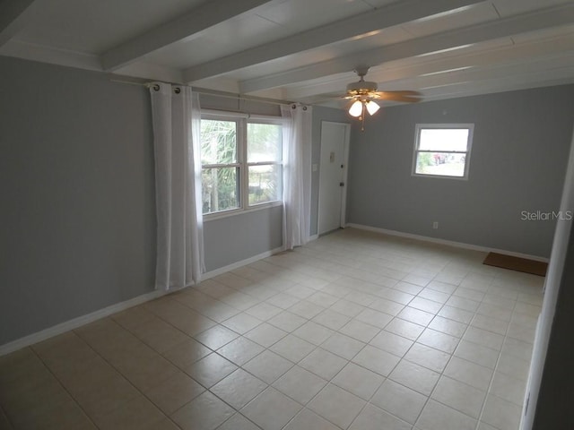 unfurnished room featuring light tile patterned floors, baseboards, a ceiling fan, and beam ceiling