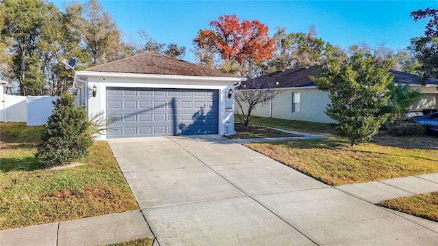 ranch-style home with a front lawn