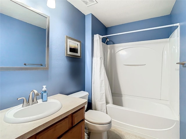 full bathroom featuring toilet, shower / tub combo, and vanity