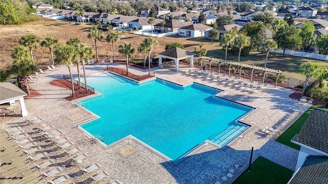 view of pool with a patio area and a gazebo