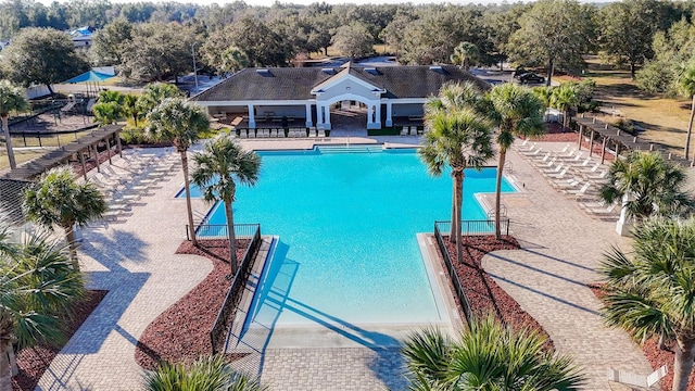 view of swimming pool with a gazebo and a patio area