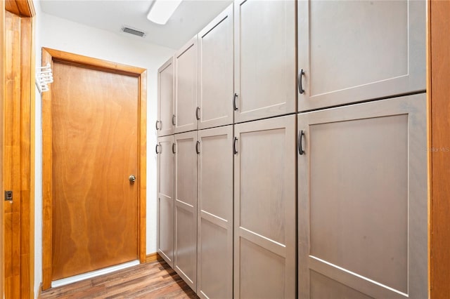 interior details with hardwood / wood-style flooring