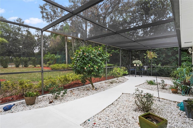 view of patio / terrace with glass enclosure