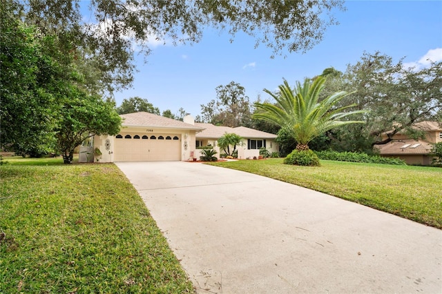 ranch-style house with a front yard and a garage