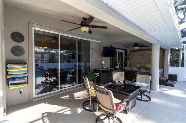 view of patio / terrace with a ceiling fan