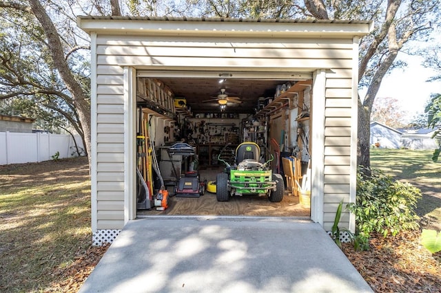 garage featuring fence