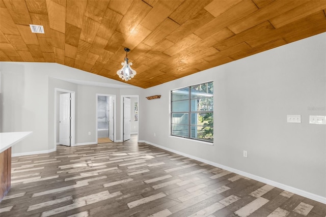 interior space with vaulted ceiling and wood ceiling