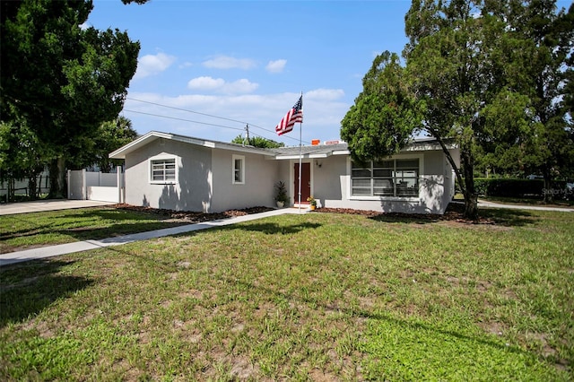 ranch-style house with a front yard