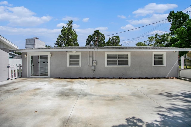 back of house with a patio area