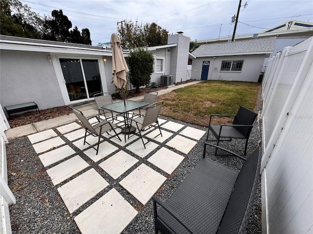 view of patio featuring cooling unit