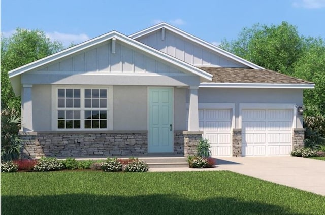 craftsman house with a front yard and a garage