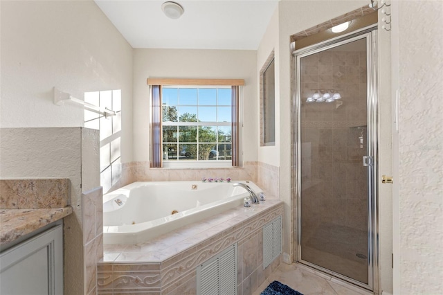 bathroom featuring plus walk in shower and vanity