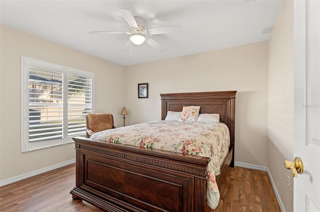 bedroom featuring ceiling fan and light hardwood / wood-style floors