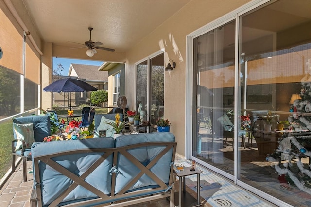 view of patio / terrace featuring ceiling fan