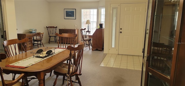 dining room with light tile patterned flooring