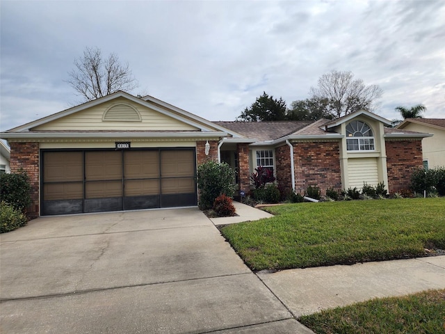 single story home featuring a front yard and a garage