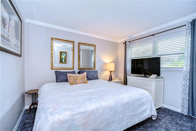 bedroom featuring a textured ceiling, dark colored carpet, and ornamental molding