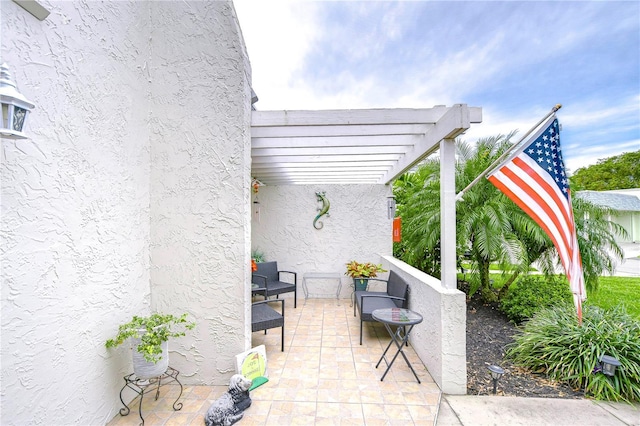 view of patio / terrace featuring a pergola