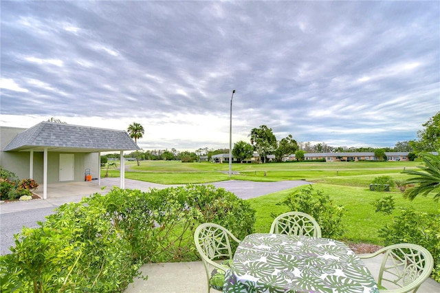 view of yard with a carport