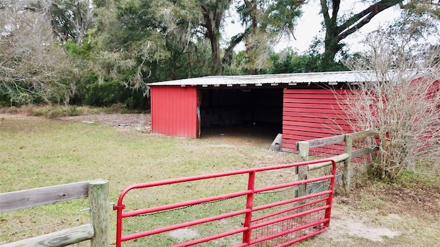 view of outdoor structure with a lawn