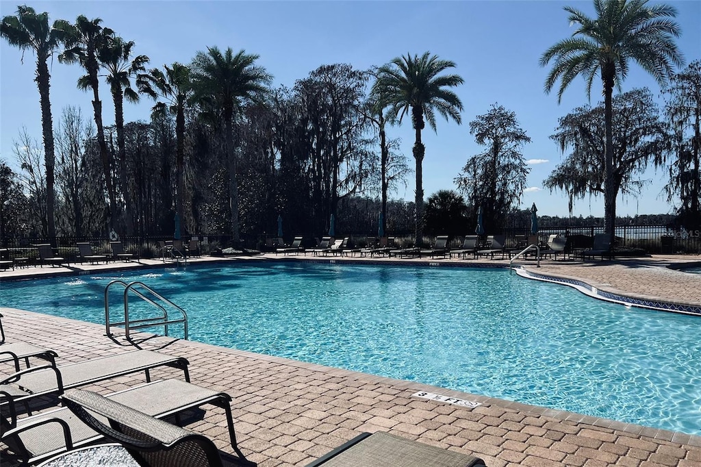 view of swimming pool featuring a patio area