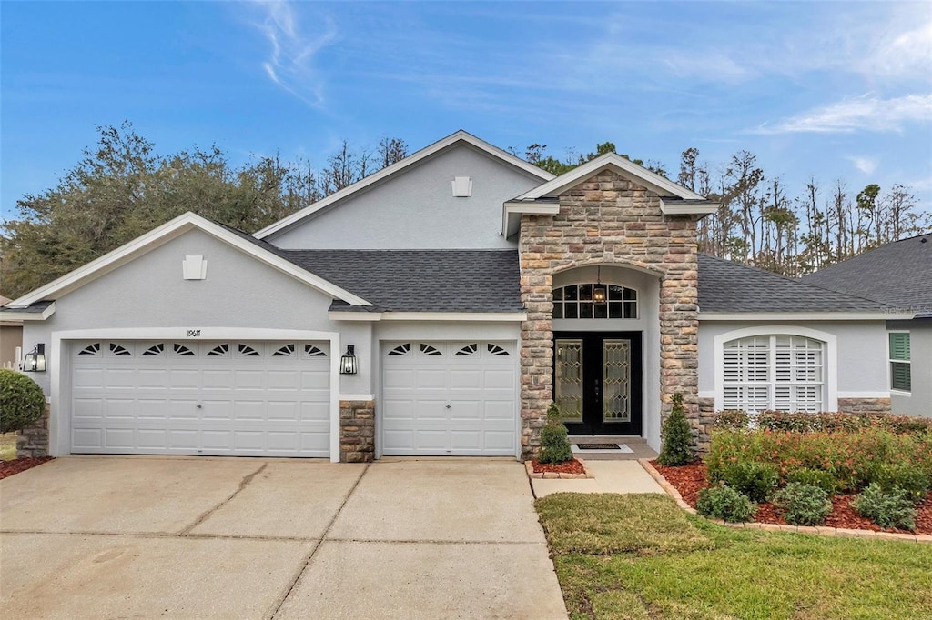 front facade with a garage