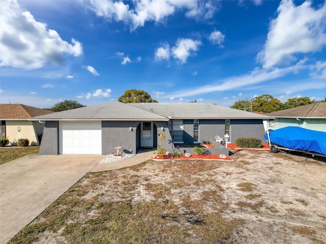 ranch-style home with a garage