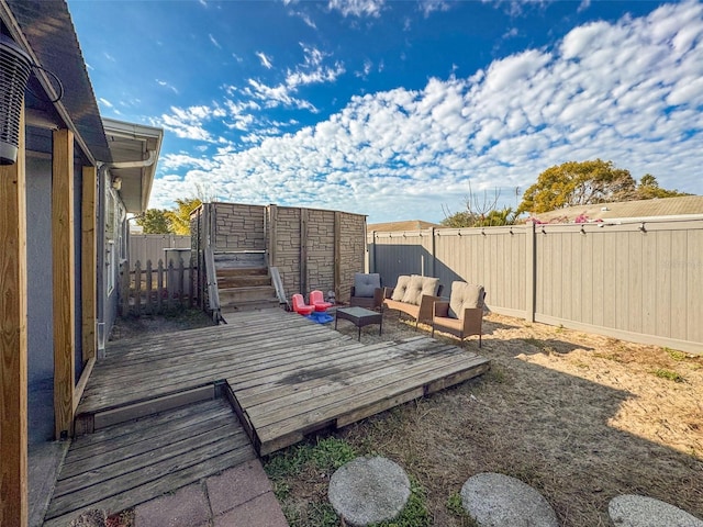 wooden deck with an outdoor hangout area