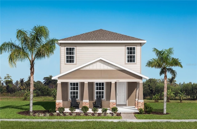 view of front of property featuring a front yard