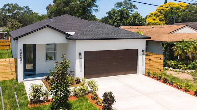 view of front of home with a garage