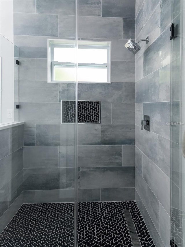 bathroom featuring walk in shower