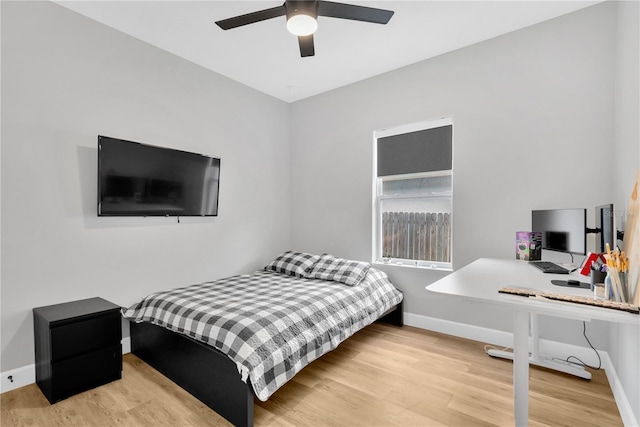 bedroom featuring ceiling fan and light hardwood / wood-style floors