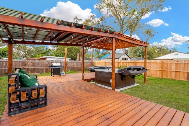 wooden deck with a lawn, a hot tub, and a pergola