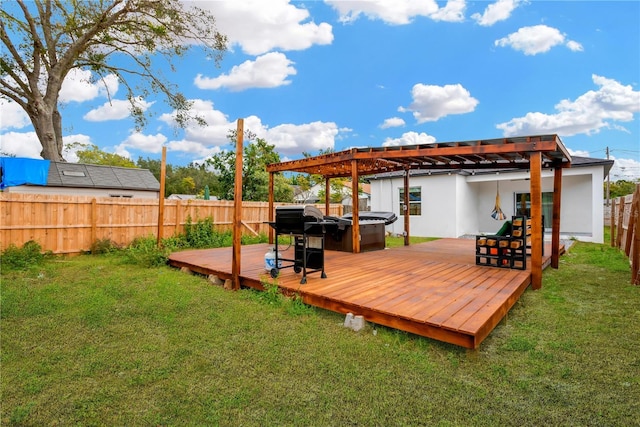 exterior space featuring a yard, a hot tub, and a pergola