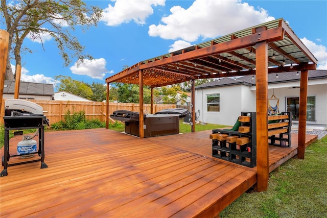 wooden terrace with a pergola, a hot tub, and a grill