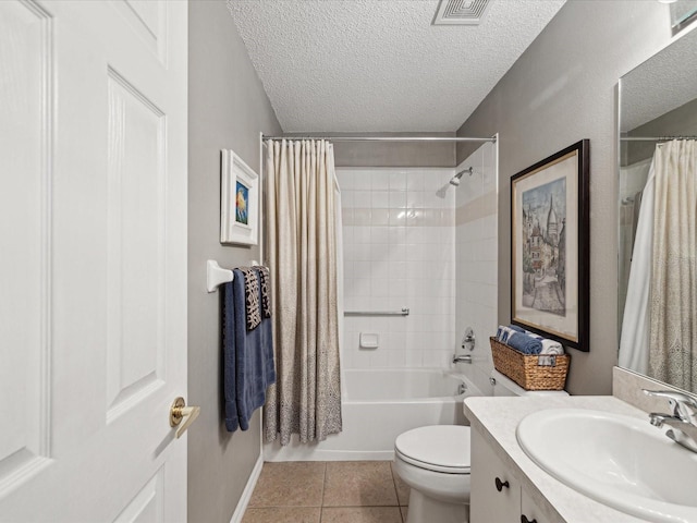 full bathroom featuring toilet, a textured ceiling, tile patterned floors, vanity, and shower / bathtub combination with curtain