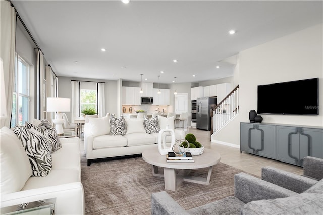 living room featuring light tile patterned flooring