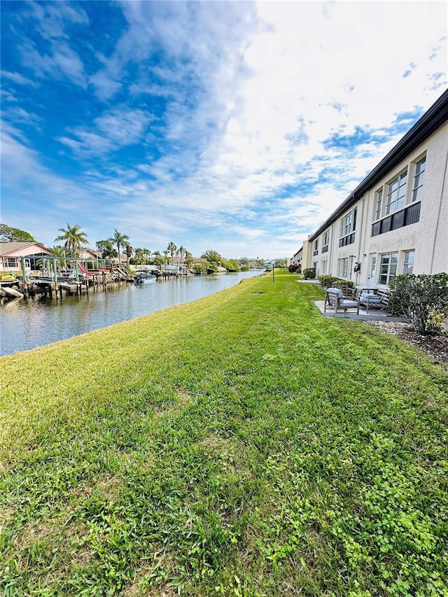 view of yard with a water view